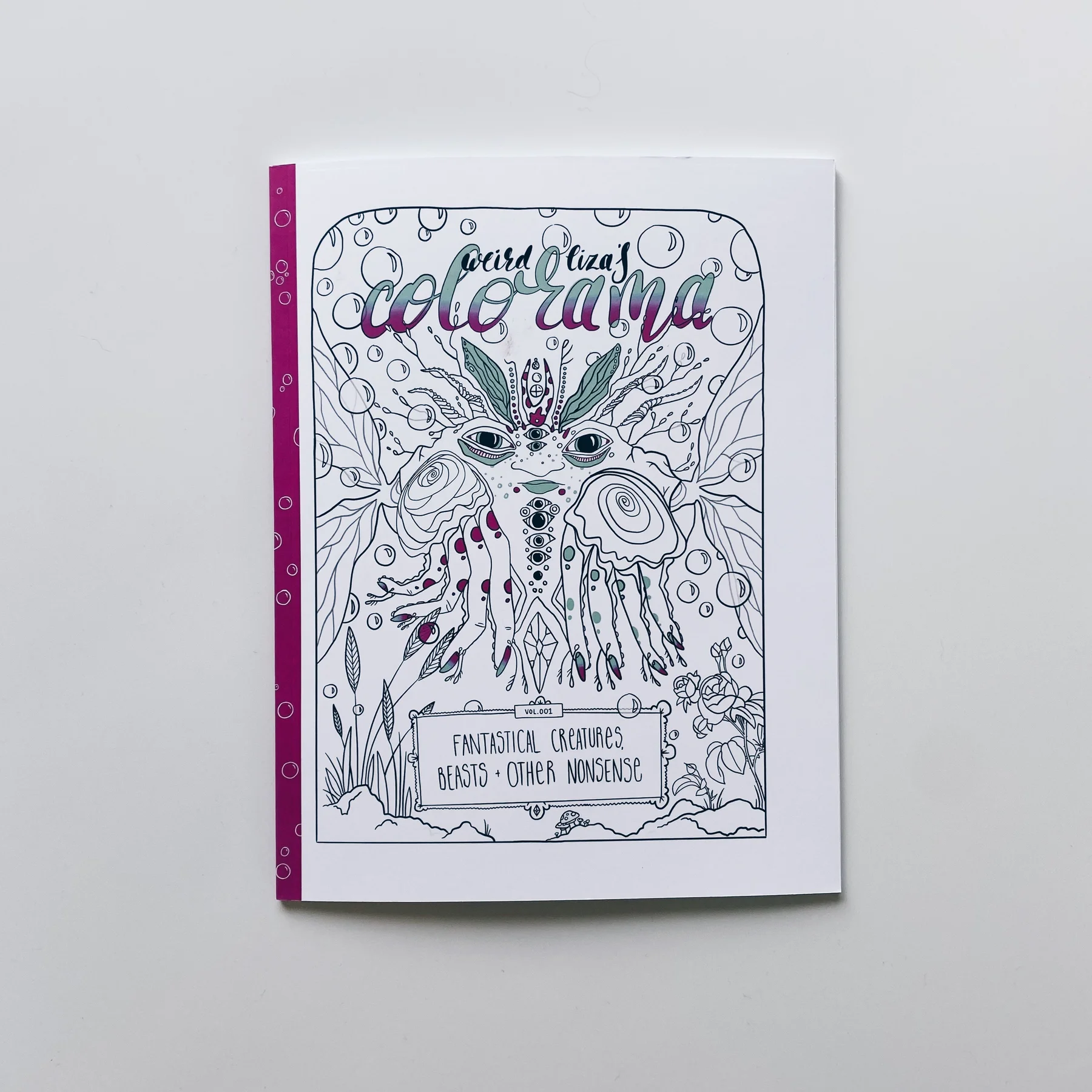 coloring book cover of weird lizas colorama volume 1 with illustration of moth creature and pink spine on white background.