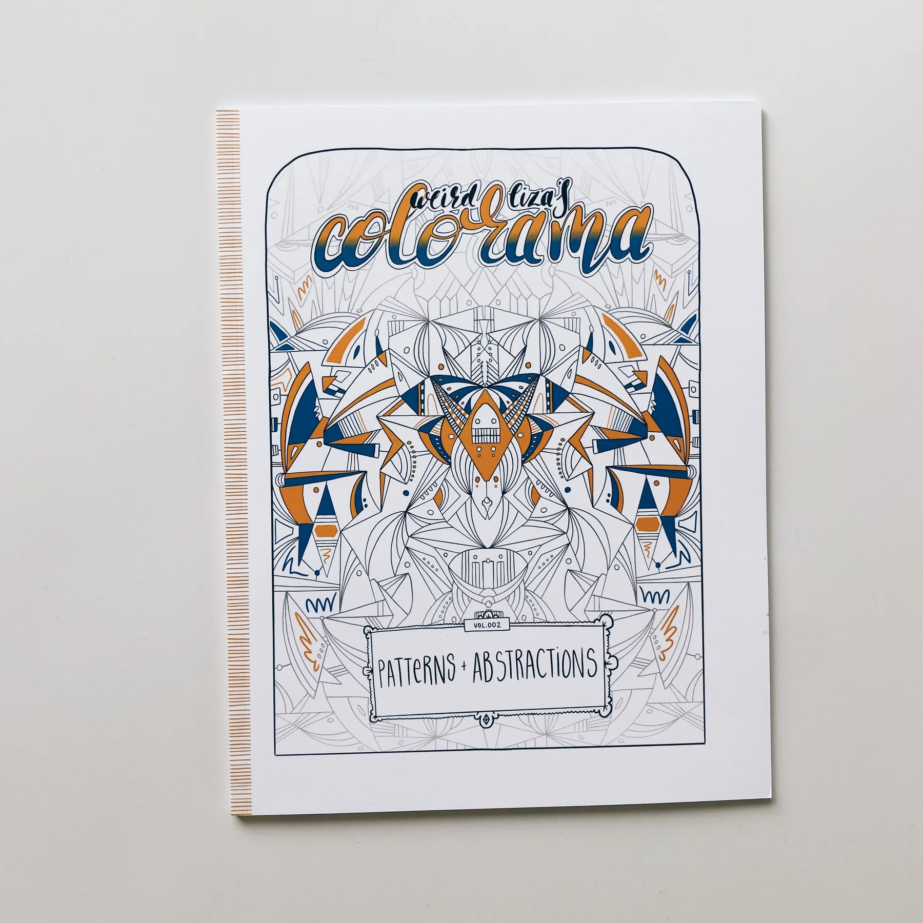 coloring book cover of weird lizas colorama volume 2 with illustration of intricate geometric pattern on white background.