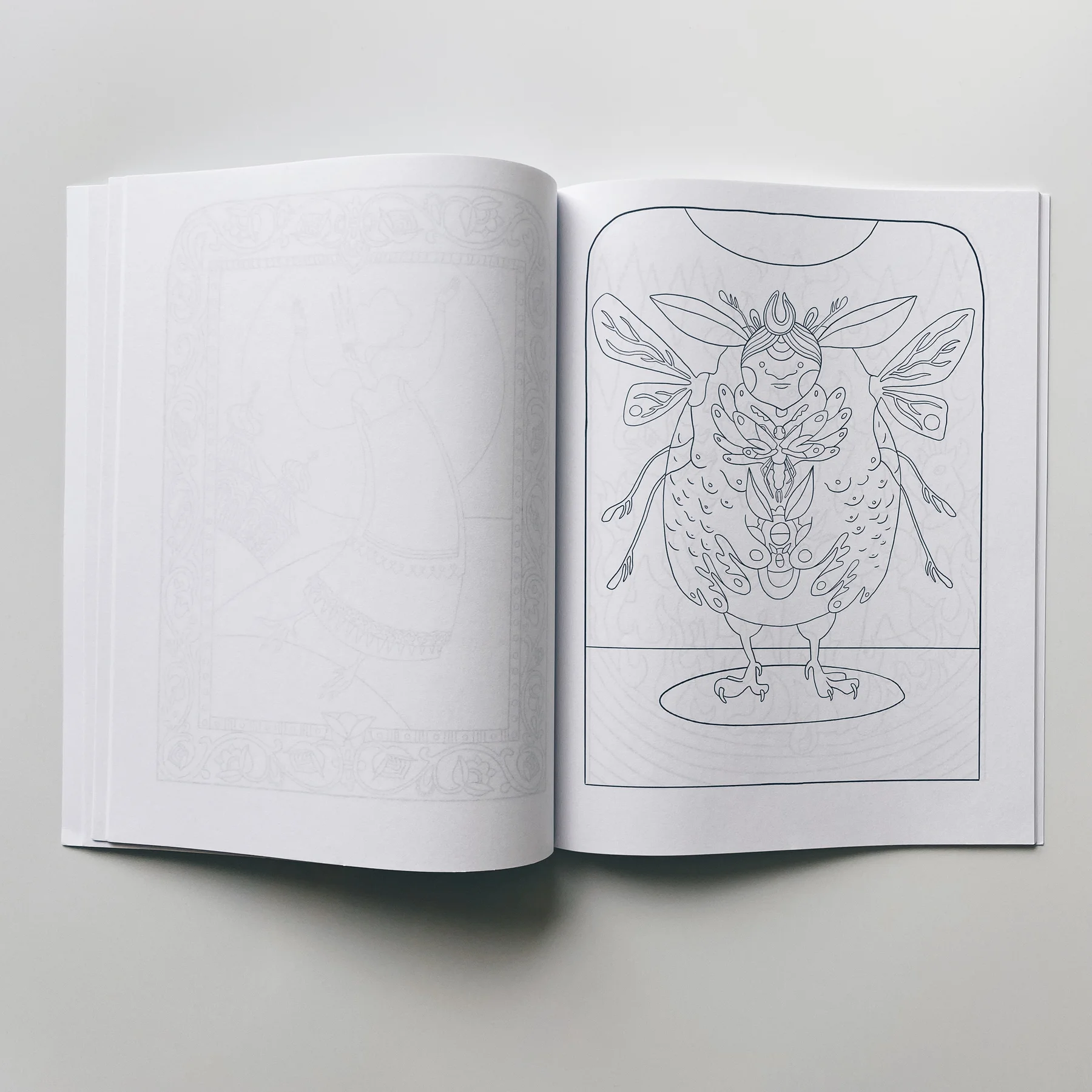interior page of weird lizas colorama volume 3 with illustration of moth bird monster woman. page is uncolored, book open on white background.